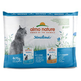 Almo Nature Sterilised multipack, 6x70g wet food for adult sterilised cats. Varieties: cod and chicken. Brand supports biodiversity and climate protection.