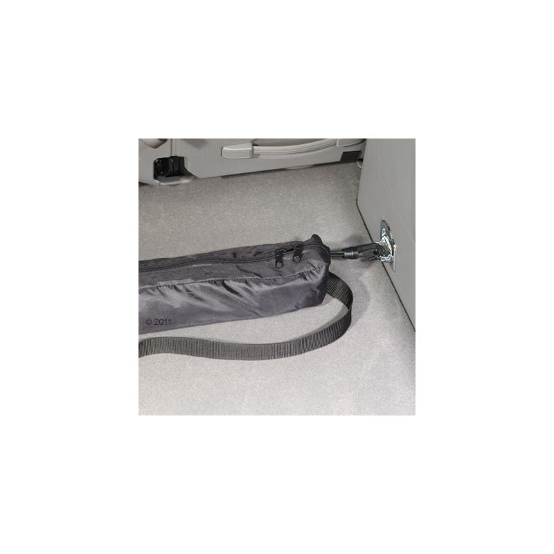 Black transport bag with zip, attached to a metal holder in the car. Suitable for secure fastening during travel.