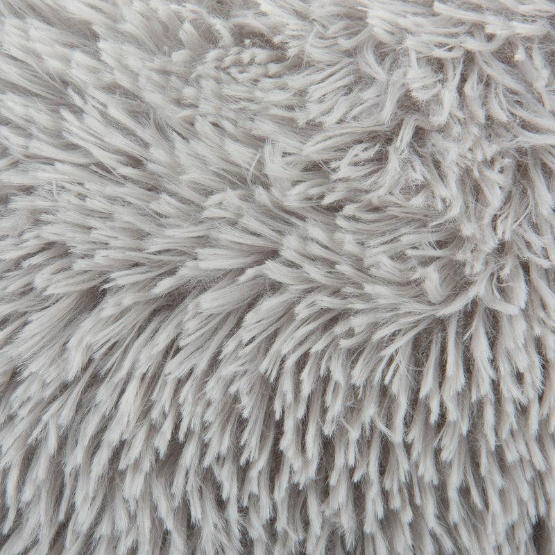 Close-up of grey, fluffy material with long fibres, possibly suitable for pet beds or blankets.