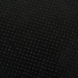 Black fabric with non-slip studs, suitable for secure placement of pet accessories.