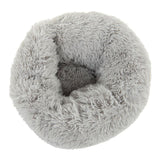Round, grey cuddly bed made of soft plush material with raised edge.