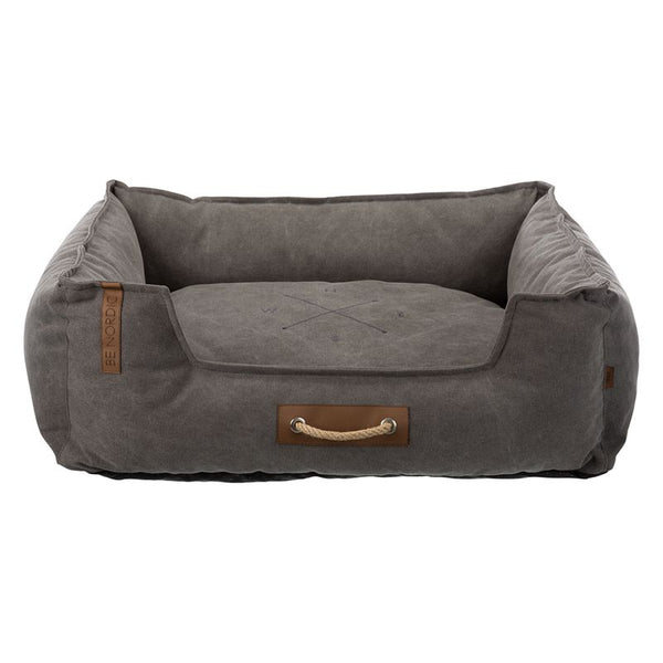 Be Nordic dog bed in dark grey with rope handle and embroidered compass design on the lying surface.