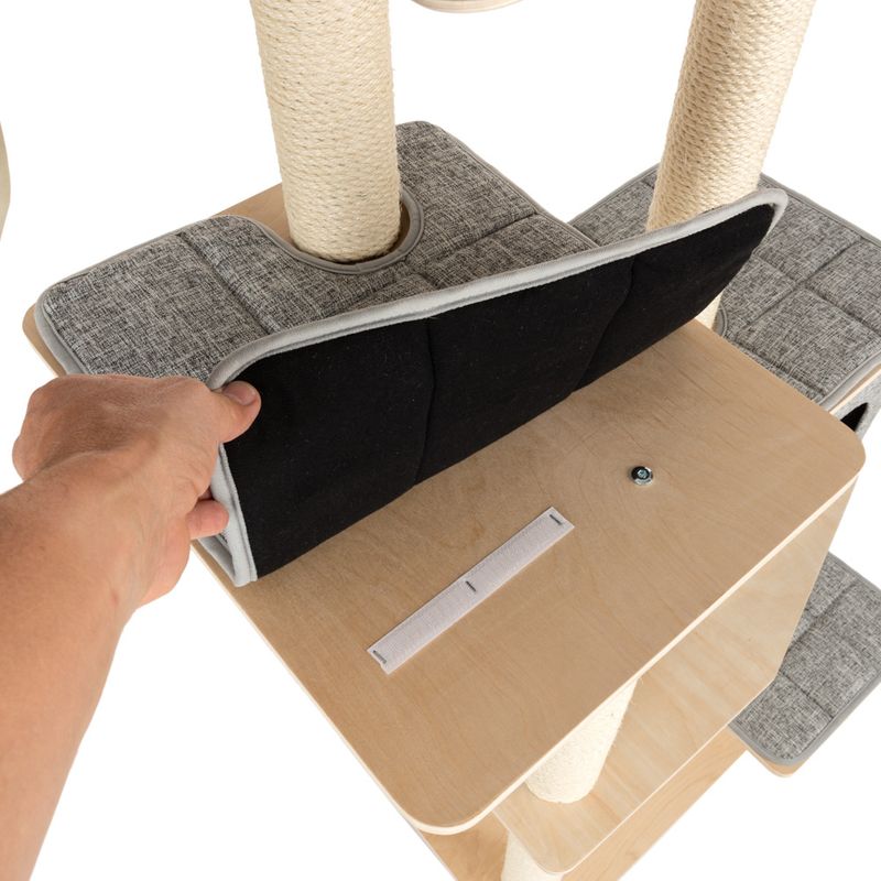 Cat tree with removable, padded fabric cover and hook-and-loop fastener. Wooden platform with visible sisal posts.