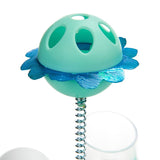 Toy with green plastic ball, blue fabric leaves and metal spring. Suitable for interactive play.