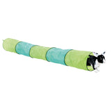 Green and blue fabric play tunnel with a black and white rabbit peeking out at the end of the tunnel.