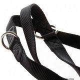 Black nylon harness with adjustable straps and two metal rings for secure fastening.