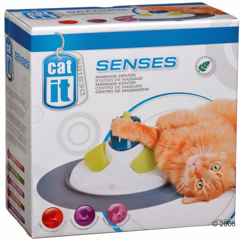Catit Design Senses Massage Center. Packaging shows an orange cat with massage device. Includes text: Massage-Center, Station de Massage, Centro de Masajes. Certificate for safe materials.