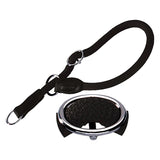 Black dog collar made of braided material with chrome-plated metal rings and buckle. Close-up of robust workmanship.