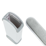 Grey and white lint brush cleaner with removable brush, suitable for removing pet hair.