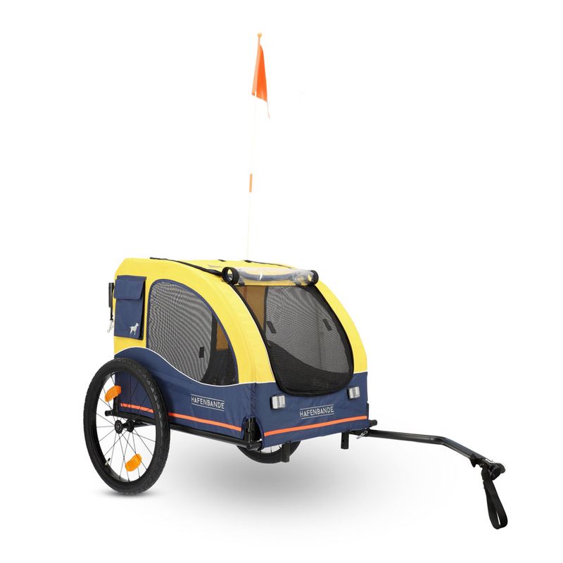 Yellow and blue bicycle trailer for pets with mesh windows, orange safety flag, and 'Hafenbande' printed on both sides.