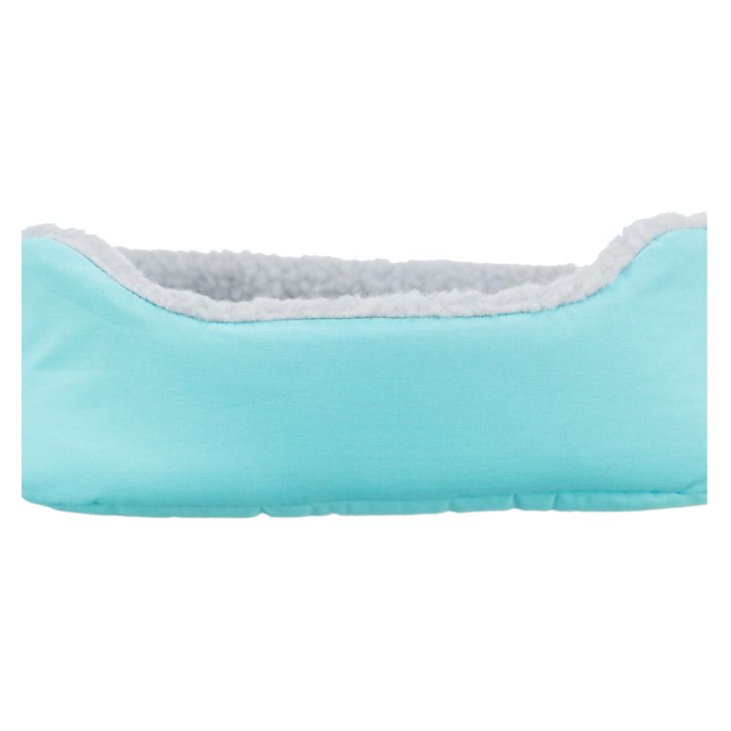 Light blue bed with soft white inner padding. Rectangular shape visible.