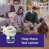 Feliway Optimum diffuser shown with cats and people in a living room, surrounded by calming effect graphics. Text reads: Help them feel calmer.