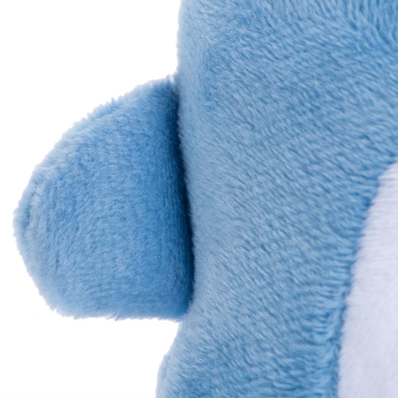 Close-up of blue plush material with a rounded shape, possibly part of a toy or accessory.