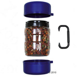 Transparent container with dry food, two blue lids and black carabiner. Accessory for storing pet food.