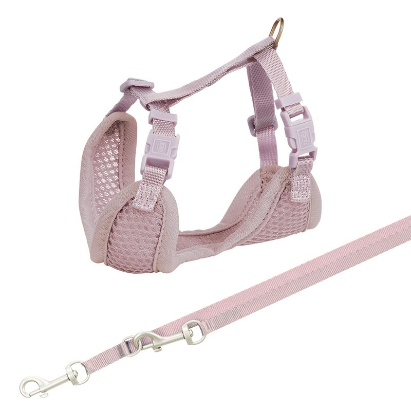 Adjustable mesh harness with two side buckles and matching lead, both in light pink. Harness features a metal ring for attaching the lead.