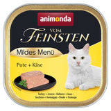 Animonda Vom Feinsten Mildes Menü turkey + cheese. Serving suggestion with cat food on a black plate and a white cat shown.