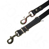Adjustable black lead with two metal clips and buckle, showing attachment points for secure fastening.