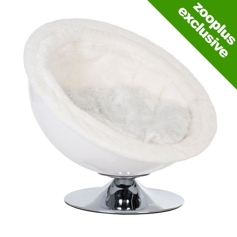 Round white pet bed with plush cushion and chrome base, shown with green corner label stating .