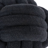 Close-up of a black, braided rope with a textured surface.