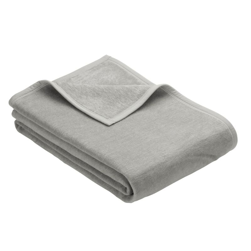 Grey blanket with rounded edges, shown folded.