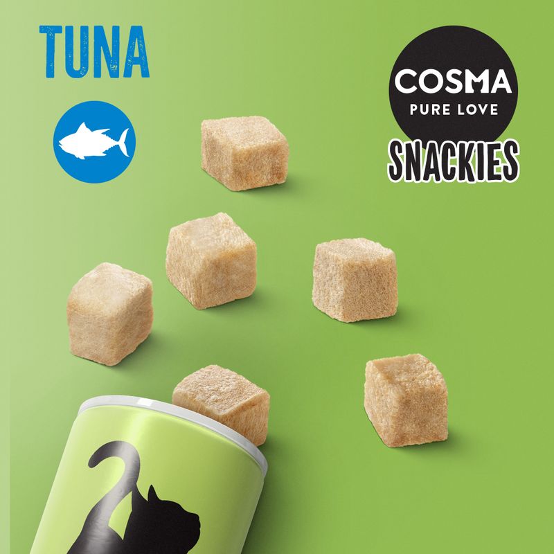 Cosma Pure Love Snackies with tuna, freeze-dried cubes. Green background with can and fish symbol.