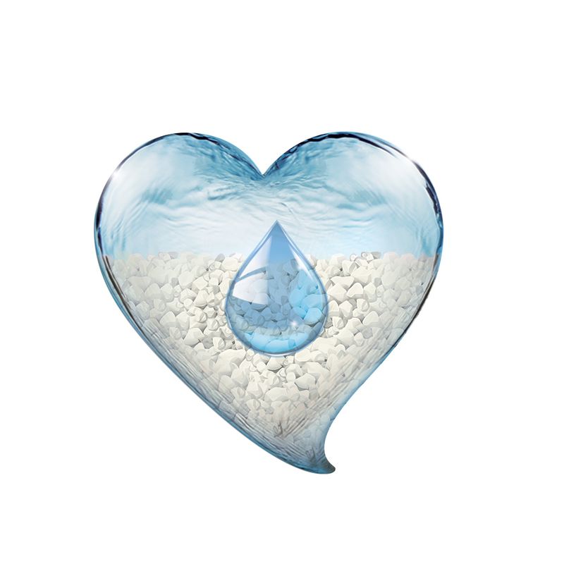 Heart-shaped display with water and white stones, symbolising moisture retention.