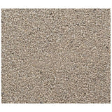 Close-up view of fine, light brown granules, showing the texture and size of the product material.