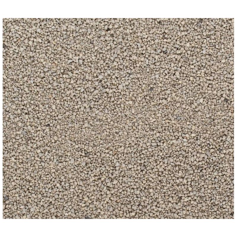 Close-up view of fine, light brown granules, showing the texture and size of the product material.