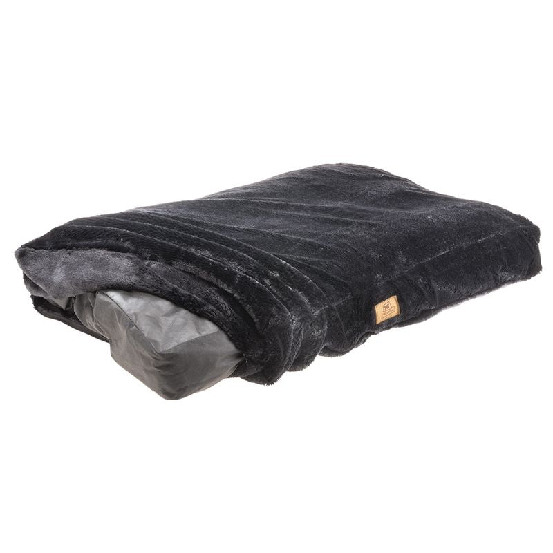 Black rectangular pet bed with soft plush cover and visible brand label on the side.