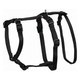 Black adjustable harness with buckles and metal ring, suitable for pets. Durable material visible.