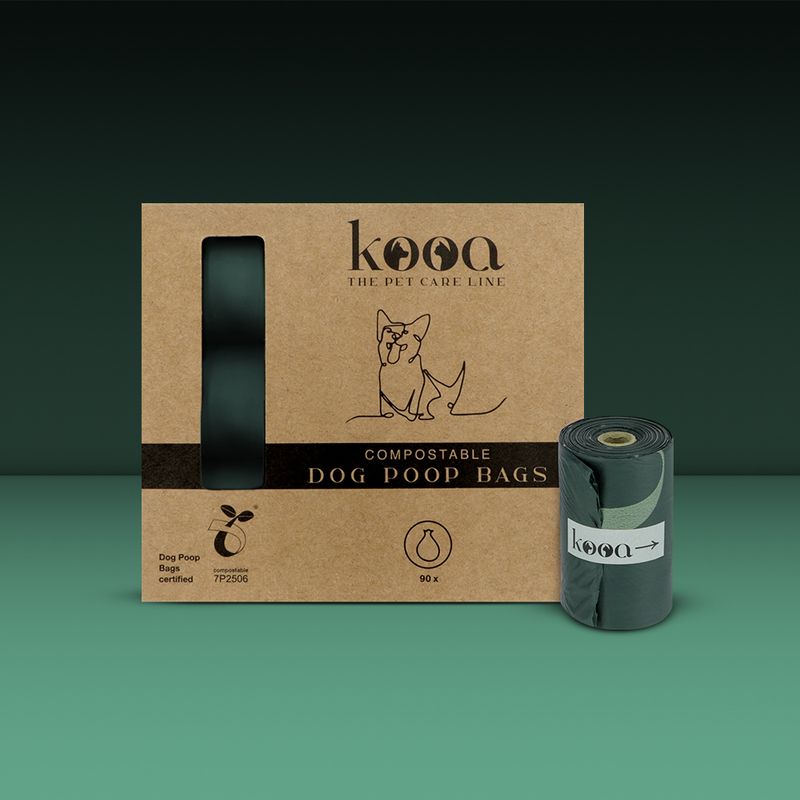 kooa The Pet Care Line. Compostable dog waste bags, certified, 90 pieces. Packaging with dog graphic and visible roll of bags.