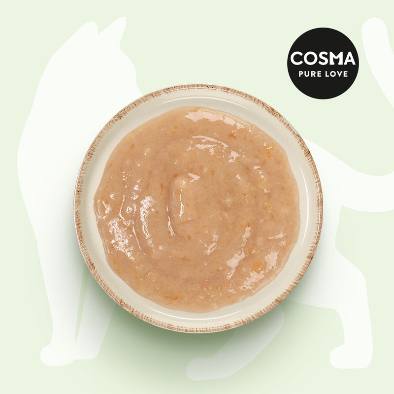 Cosma Pure Love. Bowl with creamy texture, light brown colour on green background with cat outline.
