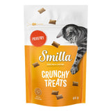 Smilla Crunchy Treats with poultry, 65g. Contains taurine. Resealable packaging. Cat shown on orange and white pack.