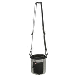 Grey treat bag with adjustable shoulder strap, mesh front pocket and carabiner. Suitable for on the go.