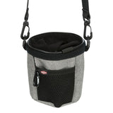 Trixie treat pouch made of grey fabric with black mesh pocket, zip and carabiner. Adjustable shoulder strap visible.