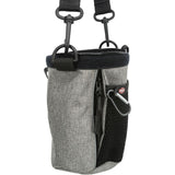 Grey bag with zip, mesh compartment and carabiner. Trixie brand visible on red label.