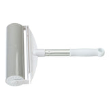 White lint roller with plastic handle and washable adhesive surface, suitable for removing pet hair.