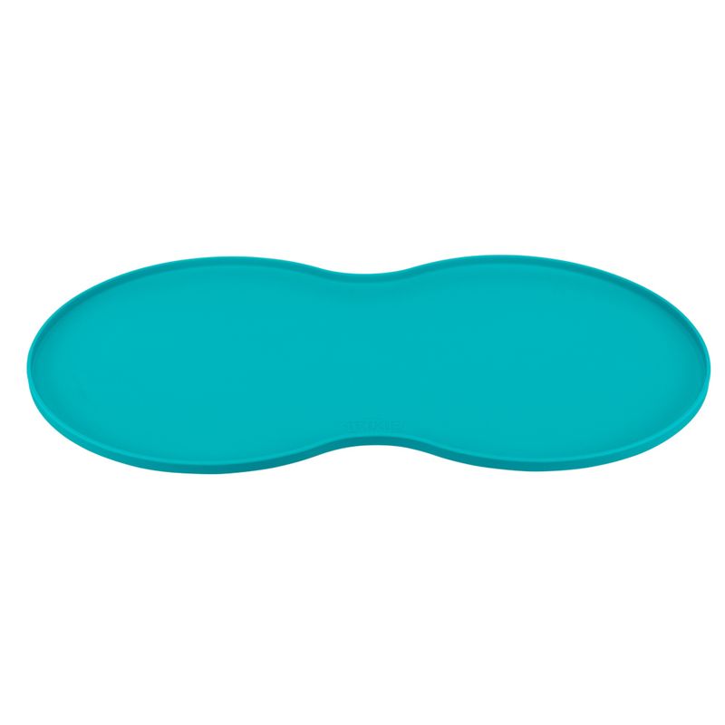 Turquoise, curved silicone mat for food bowls, non-slip and easy to clean.