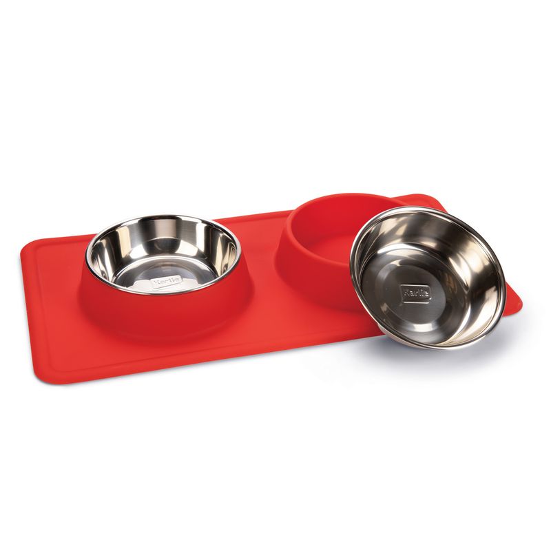 Red silicone mat with two removable stainless steel bowls, suitable for food and water.