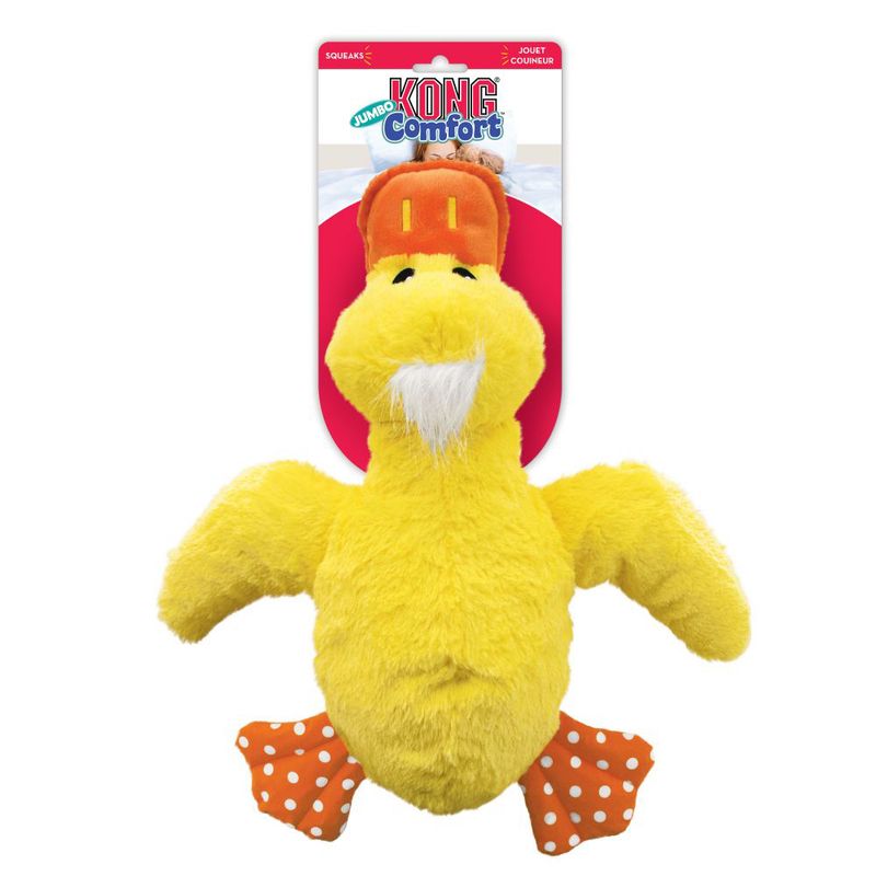 KONG Jumbo Comfort yellow plush toy in duck shape with orange beak and spotted feet. Packaging shows KONG brand and 'Squeaks' label.