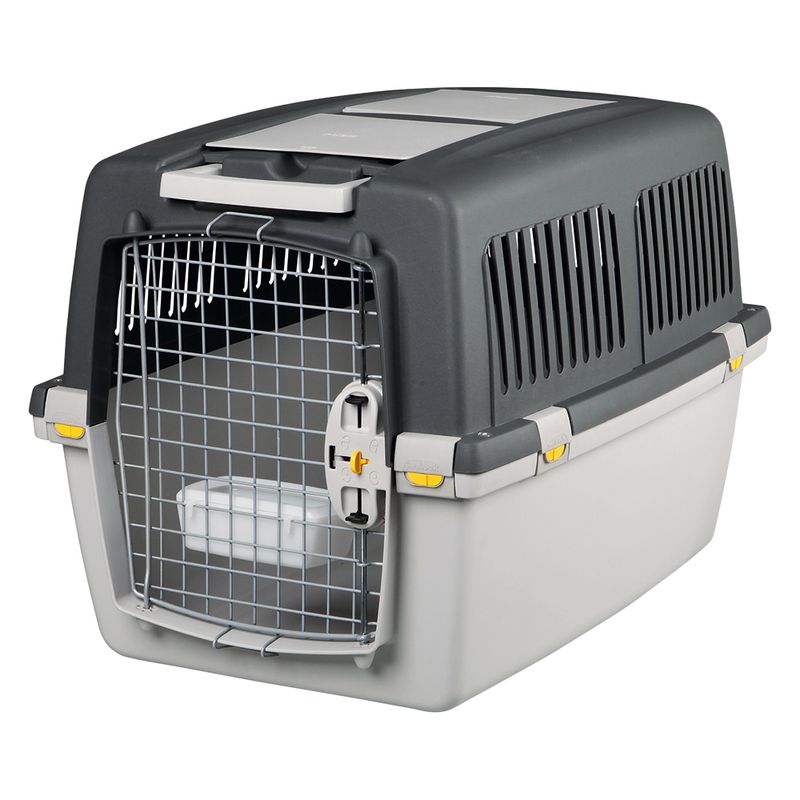 Transport box made of plastic with metal grid door, side ventilation slots and safety lock. Suitable for travel or animal transport.