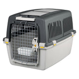 Transport box made of plastic with metal grid door, side ventilation slots and safety lock. Suitable for travel or animal transport.