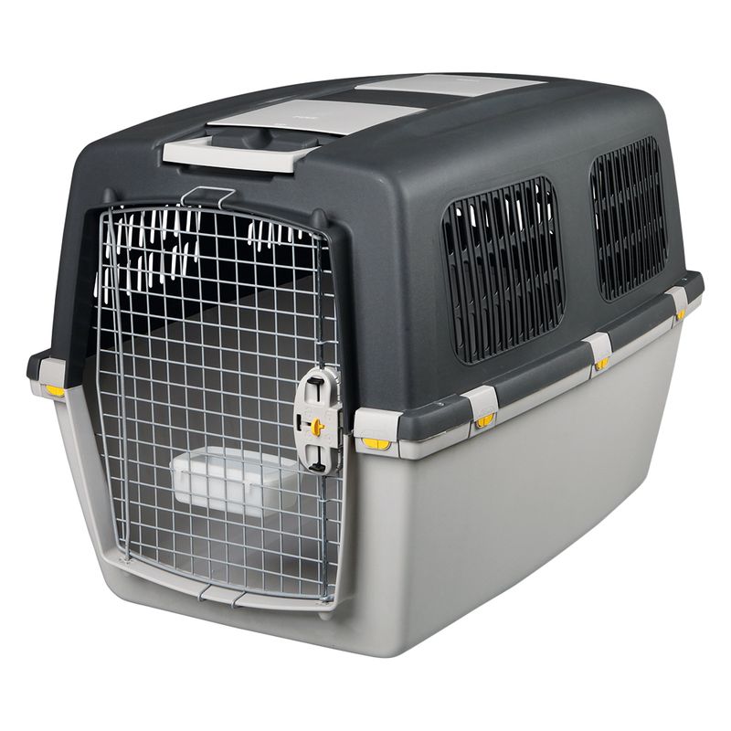 Plastic transport box with metal grid door, side ventilation slots and safety locks. Suitable for pet transport.