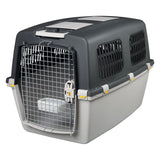 Plastic transport box with metal grid door, side ventilation slots and safety locks. Suitable for pet transport.