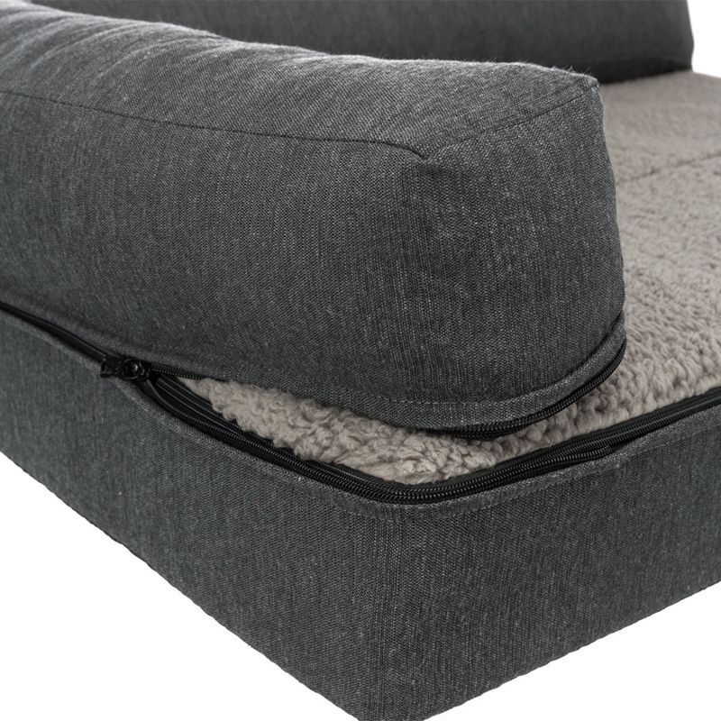 Close-up view of a grey pet bed with removable cover and zip, inner cushion made of soft plush material.