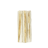 Four white chew sticks with a visible filling, arranged side by side on a plain background.