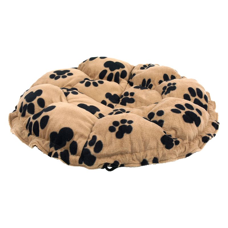 Round, padded pet cushion in beige with black paw prints. Soft material and quilted surface.