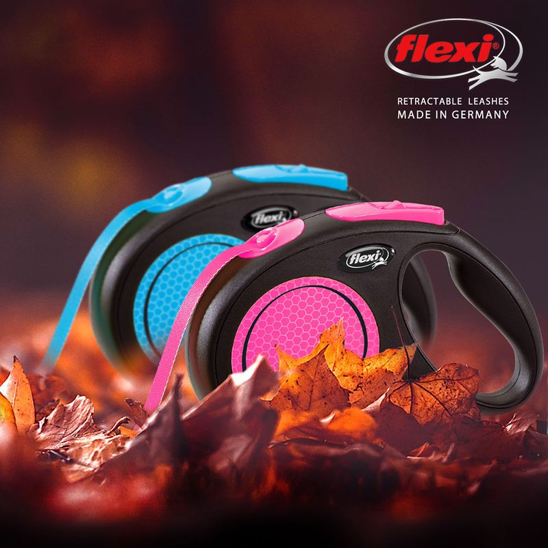 Flexi dog leads in black with pink and blue design. Text: Retractable Leashes Made in Germany.
