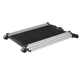 Folding ramp made of aluminium and plastic with non-slip surface, suitable for access to elevated areas.