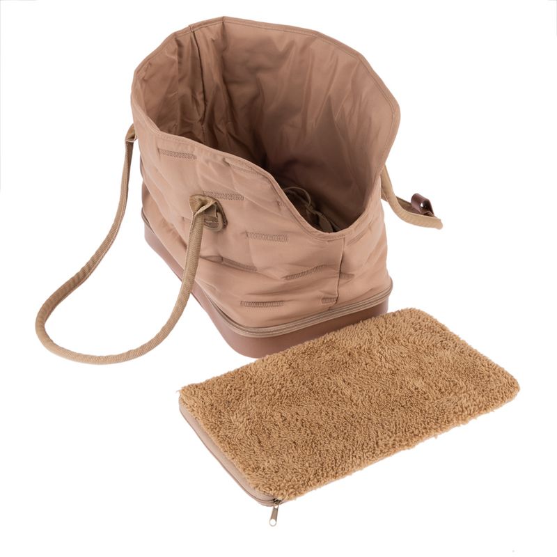 Beige carrier bag with removable, fluffy base cushion and carrying handles. Bag open, showing interior.